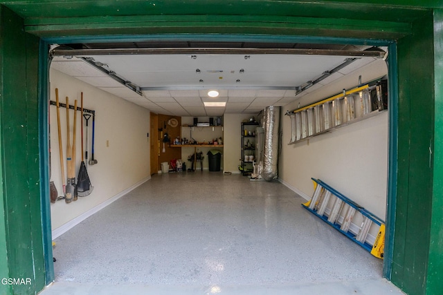 garage featuring baseboards