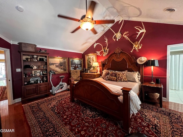 1042 Fine Glen Dr, Sevierville, TN 37862 - bedroom featuring ornamental molding, vaulted ceiling, wood finished floors, and ceiling fan