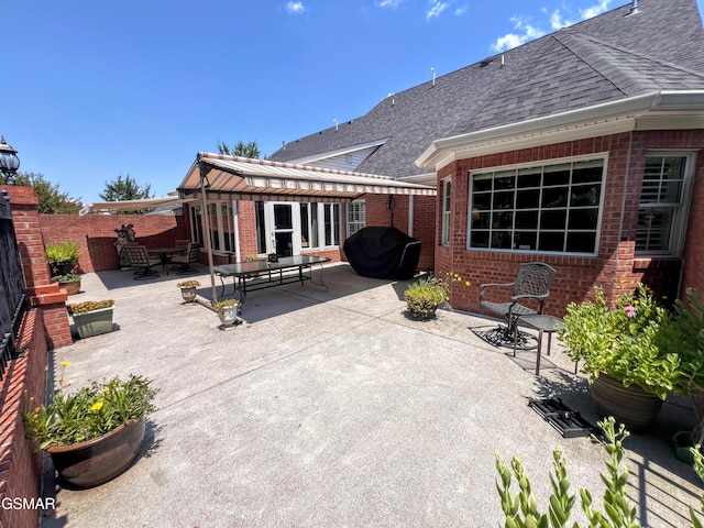 1042 Fine Glen Dr, Sevierville, TN 37862 - fenced backyard with a patio and area for grilling