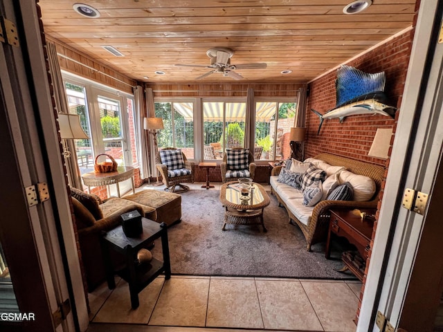 1042 Fine Glen Dr, Sevierville, TN 37862 - sunroom / solarium with wood ceiling, outdoor lounge area, a ceiling fan, brick wall, and french doors