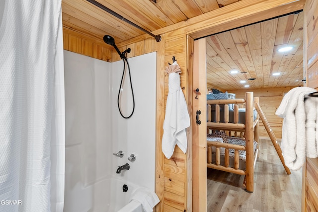 bathroom featuring shower / bathtub combination with curtain, wooden ceiling, and wood finished floors
