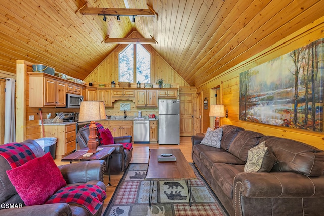 living room featuring wooden walls, track lighting, light wood finished floors, wooden ceiling, and lofted ceiling
