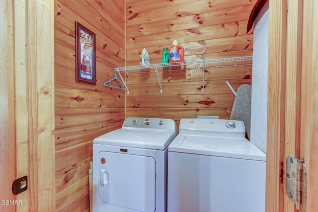 1925 Battle Top Rd, Sevierville, TN 37876 - washroom with washing machine and dryer and wooden walls
