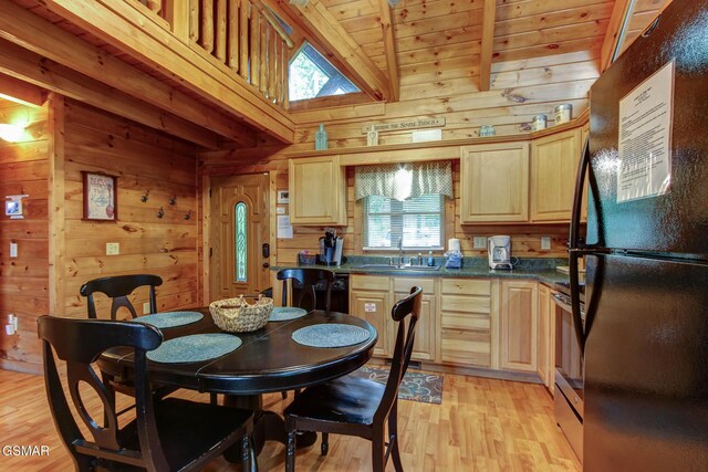 1925 Battle Top Rd, Sevierville, TN 37876 - dining area with wooden walls, plenty of natural light, light wood finished floors, and wood ceiling
