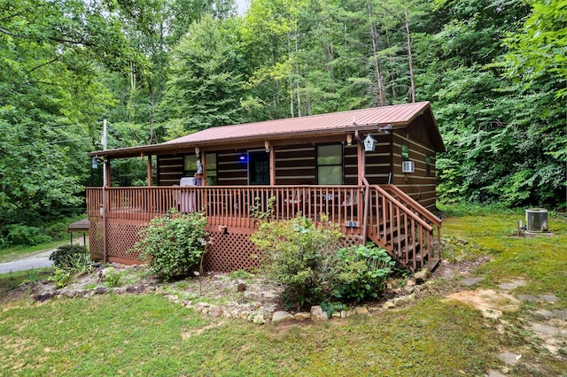 2655 Craig Circle Way, Cosby, TN 37722 - view of front of house featuring a metal roof and a forest view