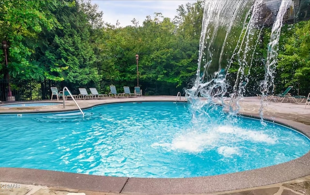 646 Gatlinburg Falls Way, Gatlinburg, TN 37738 - pool with a patio, fence, and a hot tub
