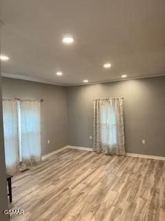 empty room featuring hardwood / wood-style flooring