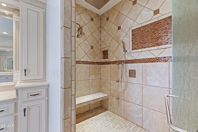 full bathroom featuring a stall shower and vanity