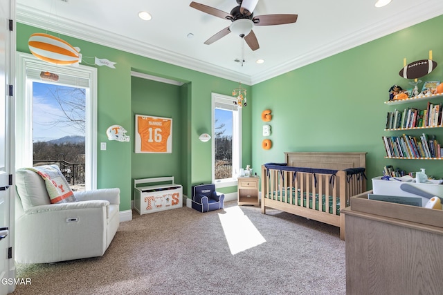 bedroom featuring carpet flooring, recessed lighting, a crib, and ornamental molding