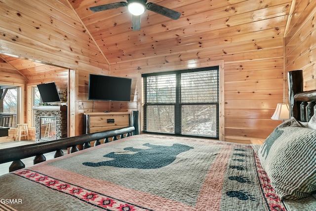 bedroom with vaulted ceiling, wooden walls, and wooden ceiling