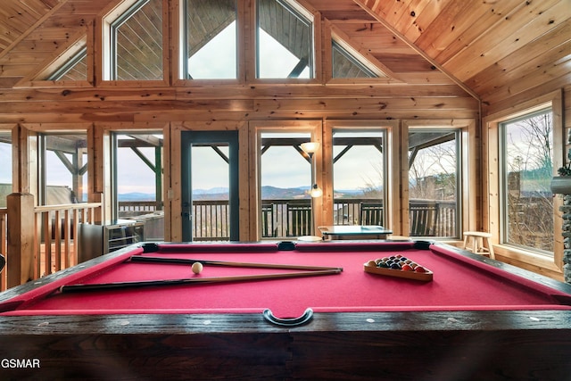 rec room with high vaulted ceiling, wood ceiling, pool table, and a mountain view