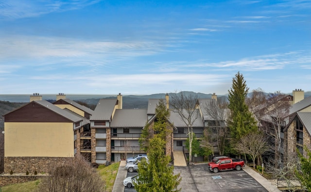 exterior space featuring a mountain view