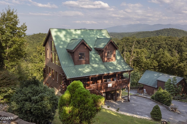 exterior space featuring a mountain view