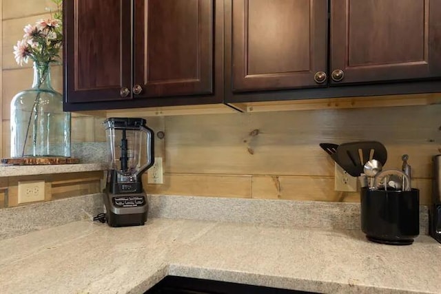 room details featuring light stone countertops