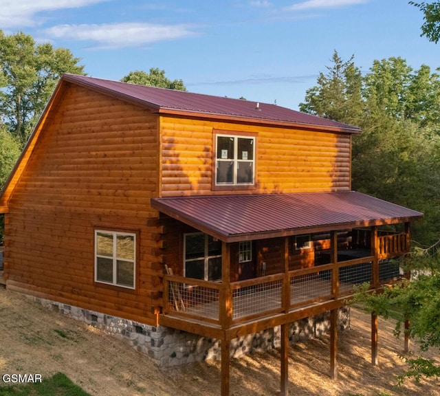 1515 Rainbow Ridge Way, Sevierville, TN 37862 - rear view of house with a metal roof, a wooden deck, and crawl space