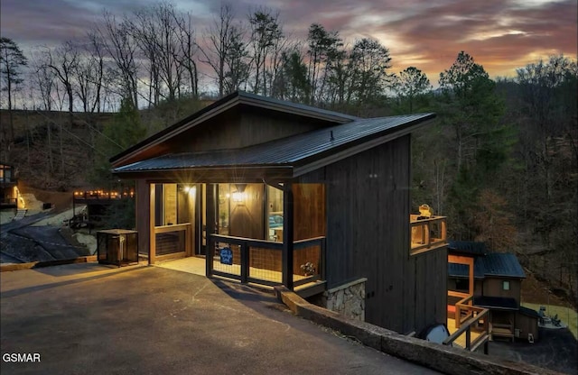 view of front of property with metal roof