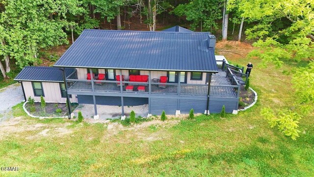 2359 Grassy Branch Rd, Sevierville, TN 37876 - back of house with a metal roof and a yard