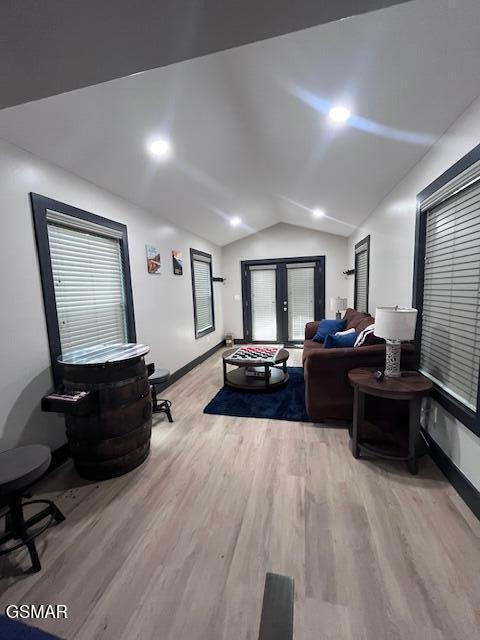 2359 Grassy Branch Rd, Sevierville, TN 37876 - living area with lofted ceiling and wood finished floors