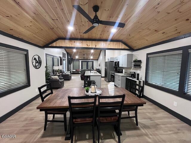 2359 Grassy Branch Rd, Sevierville, TN 37876 - dining area featuring wood ceiling, vaulted ceiling, ceiling fan, and light wood finished floors