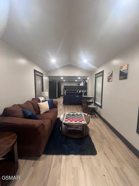 2359 Grassy Branch Rd, Sevierville, TN 37876 - living room with lofted ceiling and light wood-type flooring