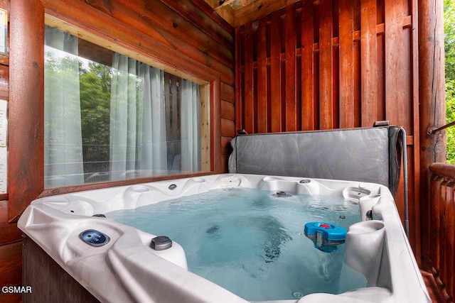 655 Stockton Dr, Sevierville, TN 37876 - miscellaneous room with a hot tub and wooden walls