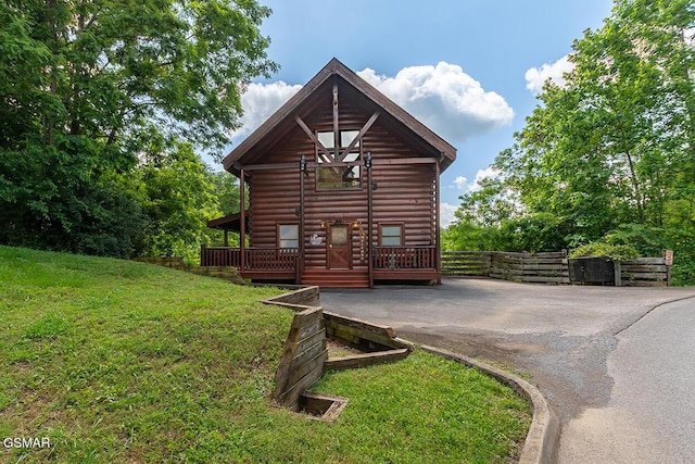 655 Stockton Dr, Sevierville, TN 37876 - view of side of home with a lawn