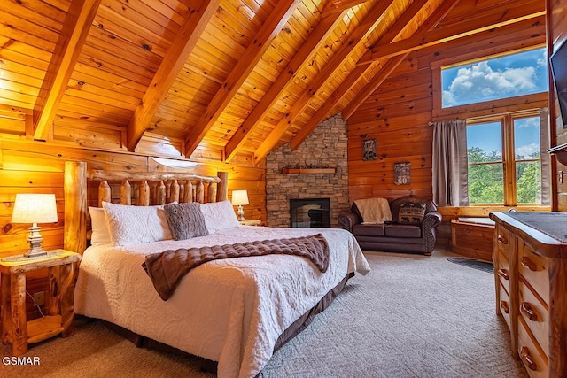 655 Stockton Dr, Sevierville, TN 37876 - bedroom featuring wooden walls, carpet floors, wooden ceiling with exposed beams, high vaulted ceiling, and a fireplace