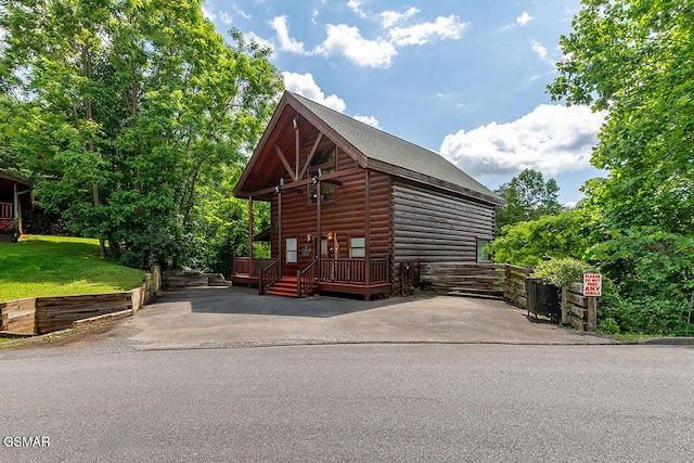 655 Stockton Dr, Sevierville, TN 37876 - view of front of property with a wooden deck and a front yard