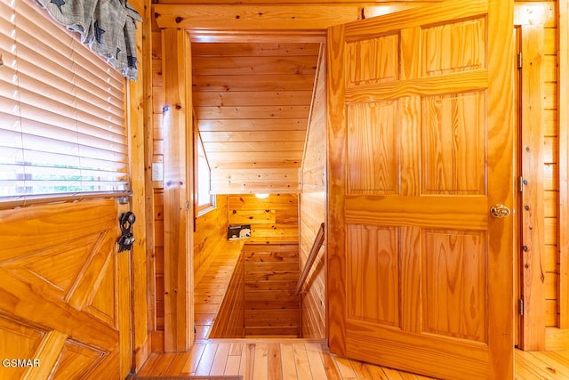 655 Stockton Dr, Sevierville, TN 37876 - stairs with wood walls and hardwood / wood-style floors