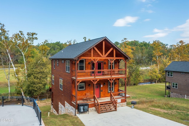 view of front of home with a front lawn and a porch