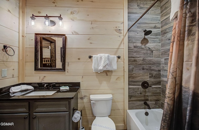 full bathroom with shower / bath combo, vanity, toilet, and wooden walls