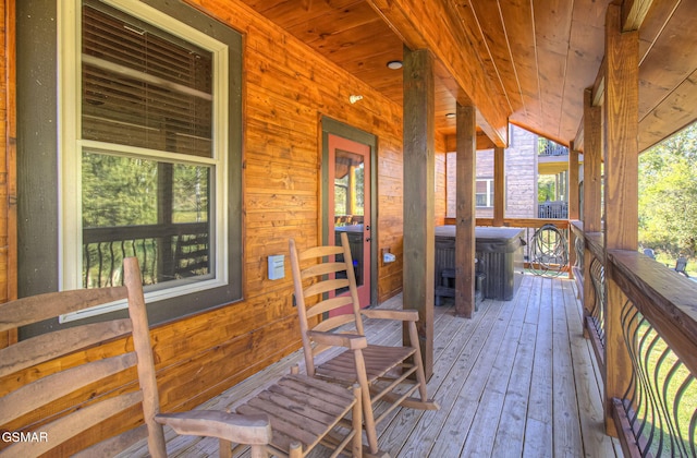 wooden deck featuring covered porch