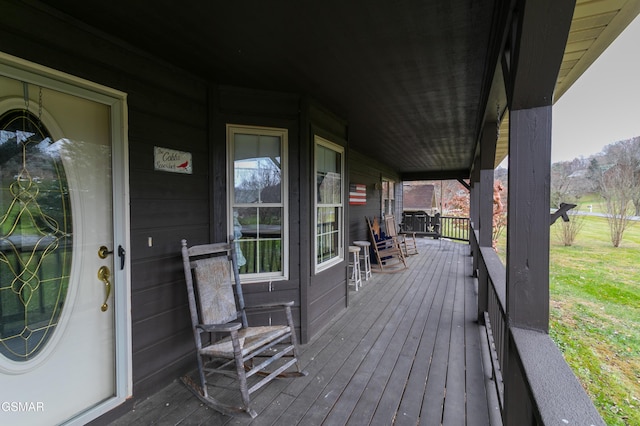 deck featuring covered porch