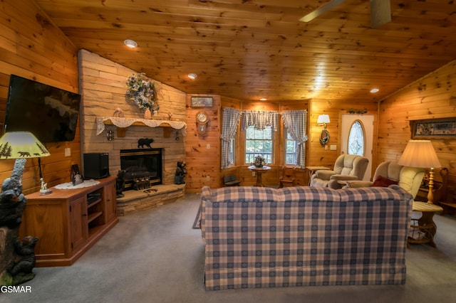 carpeted living room featuring wood ceiling and vaulted ceiling