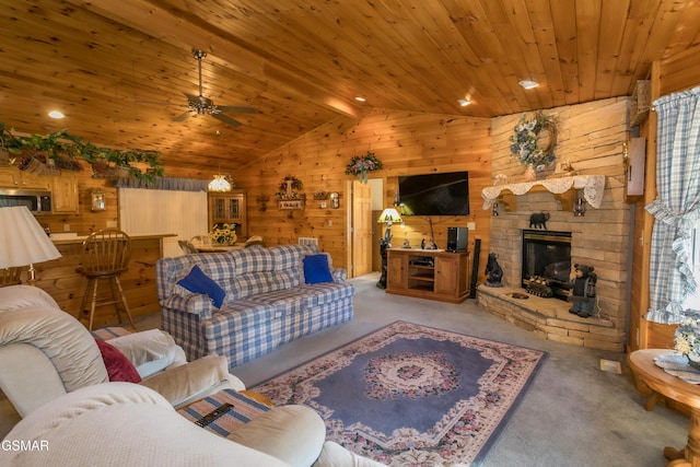 living room featuring wooden ceiling, lofted ceiling with beams, wooden walls, ceiling fan, and a fireplace