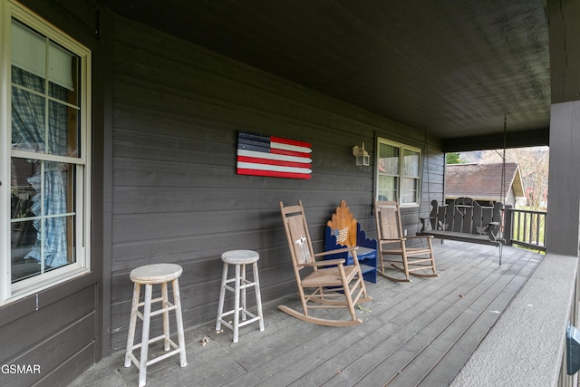 wooden terrace with covered porch