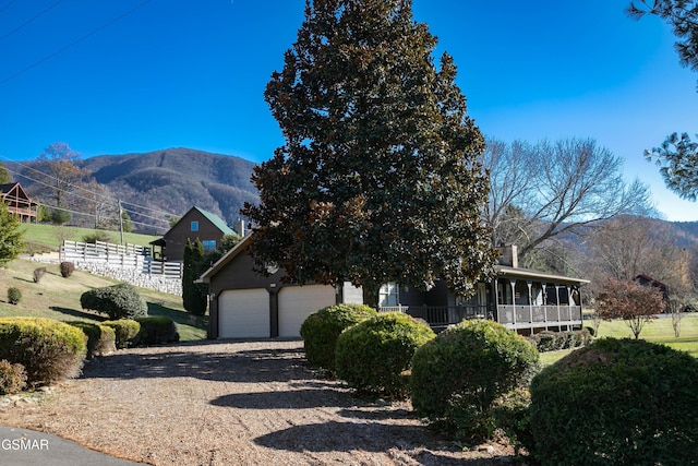 view of front facade featuring a mountain view