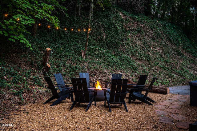 view of patio with a fire pit