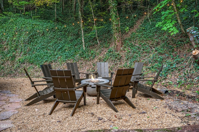 view of patio with a fire pit