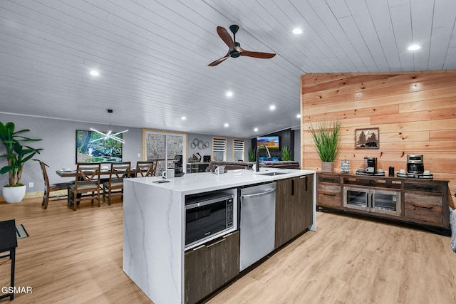 3033 N Clear Fork Rd, Sevierville, TN 37862 - kitchen with dishwasher, light wood-style flooring, built in microwave, a ceiling fan, and wood ceiling