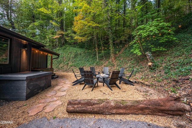 view of patio / terrace with a fire pit