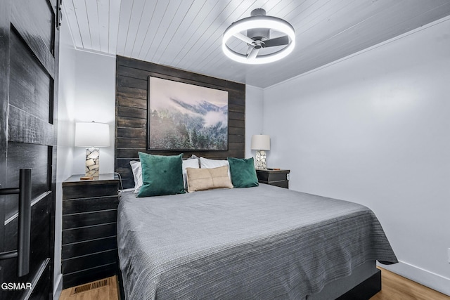 3033 N Clear Fork Rd, Sevierville, TN 37862 - bedroom featuring baseboards and wood finished floors