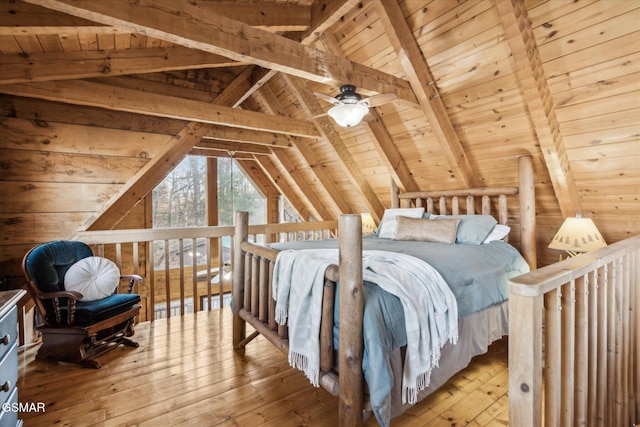 bedroom featuring vaulted ceiling with beams, hardwood / wood-style flooring, wood ceiling, and wooden walls