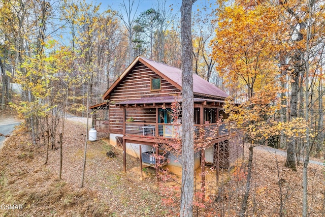 exterior space featuring a wooden deck