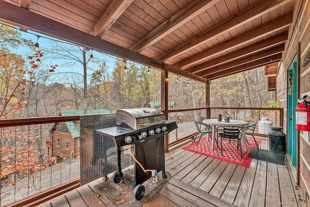 wooden deck featuring grilling area