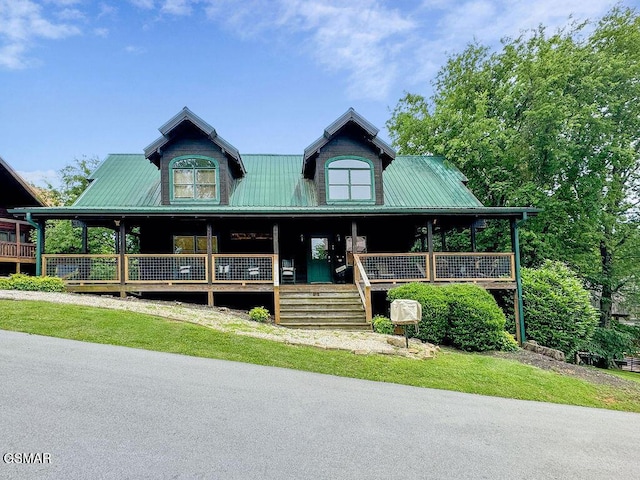 farmhouse featuring covered porch