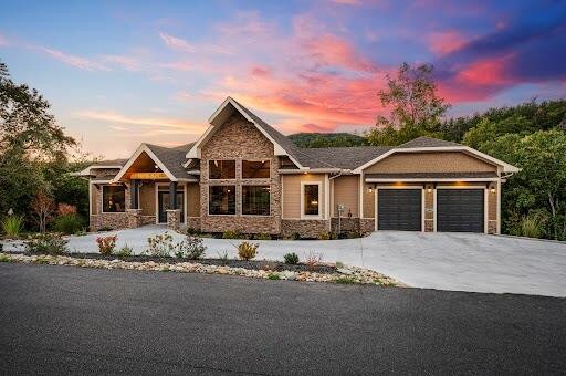 craftsman inspired home featuring a garage