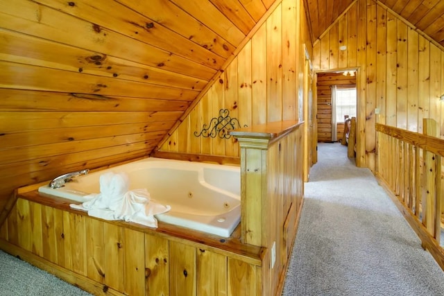 1656 Racoon Den Way, Sevierville, TN 37862 - bathroom with vaulted ceiling, a jetted tub, wooden ceiling, and wood walls