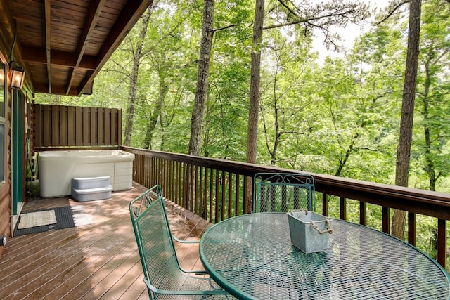 1656 Racoon Den Way, Sevierville, TN 37862 - wooden terrace featuring outdoor dining space and a wooded view