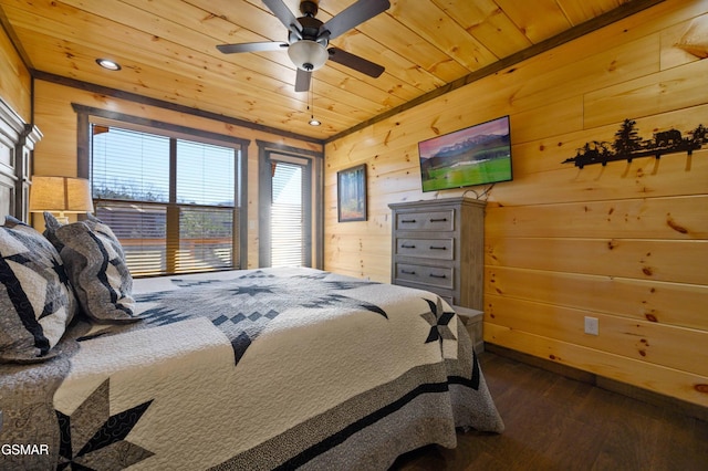 bedroom featuring wooden ceiling, recessed lighting, dark wood-type flooring, wood walls, and a ceiling fan